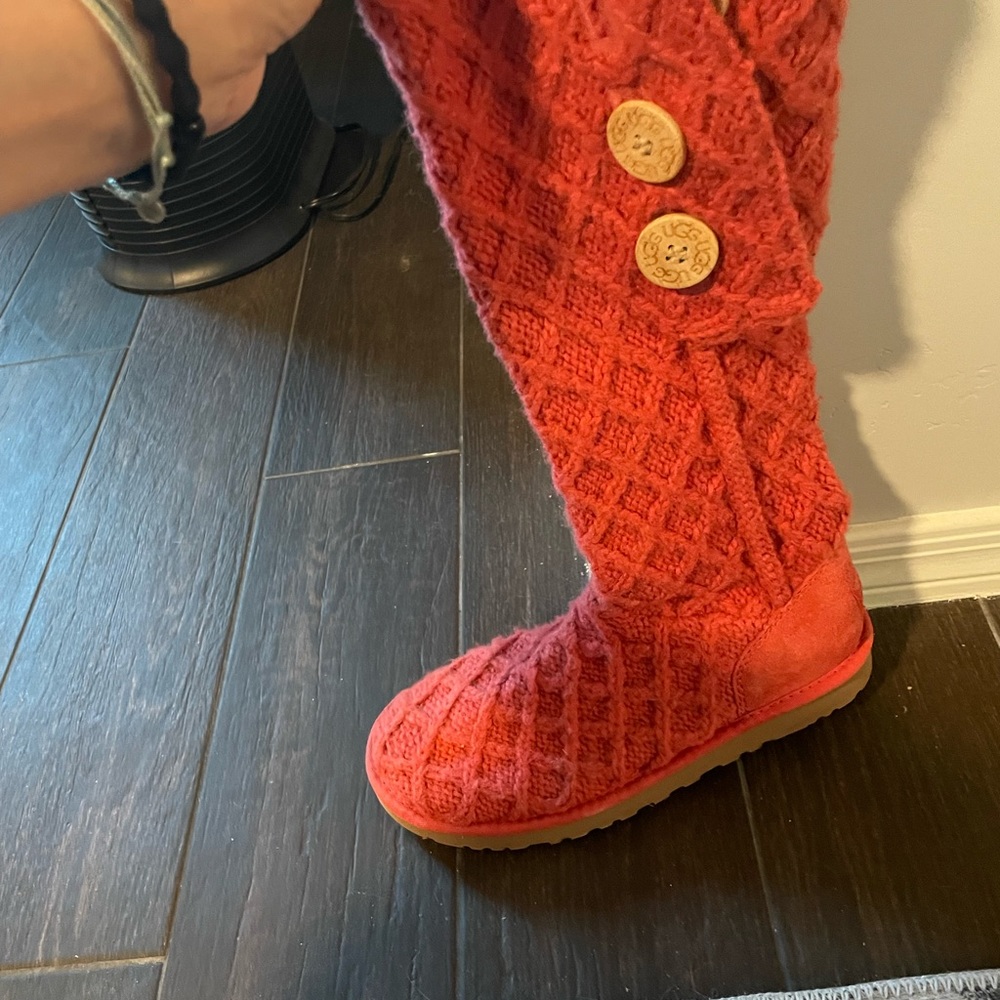 Coral knit UGG boots.